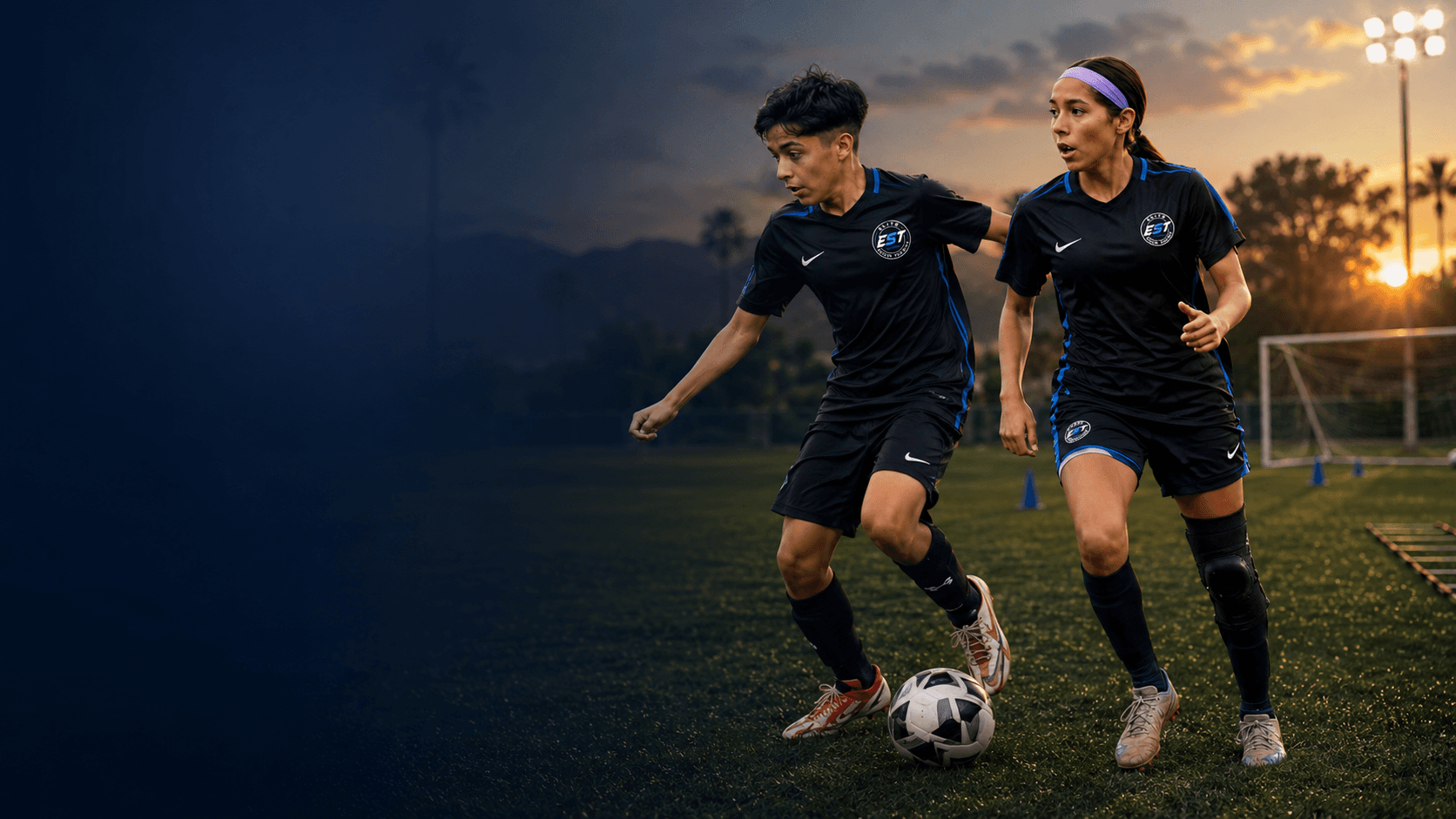 Coach and youth soccer player training on a field